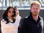 FILE - Prince Harry and Meghan Markle, Duke and Duchess of Sussex visit the track and field event at the Invictus Games in The Hague, Netherlands, Sunday, April 17, 2022. The production company founded by Prince Harry and his wife, Meghan, are splitting ways with Spotify, Friday, June 16, 2023, less than a year after the debut of their podcast “Archetypes."(AP Photo/Peter Dejong, File) FILE - Prince Harry and Meghan Markle, Duke and Duchess of Sussex visit the track and field event at the Invictus Games in The Hague, Netherlands, Sunday, April 17, 2022. The production company founded by Prince Harry and his wife, Meghan, are splitting ways with Spotify, Friday, June 16, 2023, less than a year after the debut of their podcast “Archetypes."(AP Photo/Peter Dejong, File)