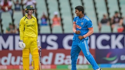 Raj Limbani (R) was the pick of the bowlers for India in the final against Australia as he finished with 3/38, which included the dismissal of Aussie opener Sam Konstas for a duck in the third over. &nbsp; (AP)