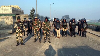 BSF personnel stand guard as security tightened at Ambala-Kaithal bypass, ahead of the farmers' call for March to Delhi on 13th February, on Sunday. (ANI) BSF personnel stand guard as security tightened at Ambala-Kaithal bypass, ahead of the farmers' call for March to Delhi on 13th February, on Sunday. (ANI)