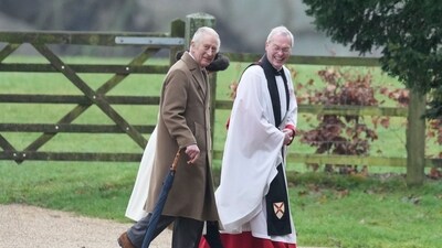 King Charles III and Queen Camilla walk with Canon Paul Williams as they arrive to attend a Sunday church service at St Mary Magdalene Church, in Sandringham. (AP) King Charles III and Queen Camilla walk with Canon Paul Williams as they arrive to attend a Sunday church service at St Mary Magdalene Church, in Sandringham. (AP)