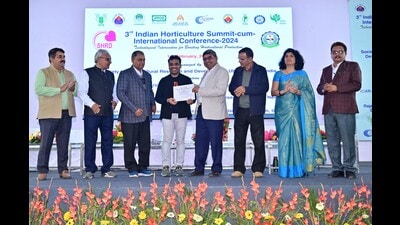 Dr Hira Singh being conferred an award during the 3rd Indian horticulture summit-cum-international conference-2024 at Rajasthan Agricultural Research Institute in Jaipur. (HT PHOTO)