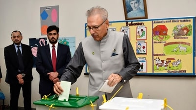 In this photo released by President Office, Pakistan's President Ariv Alvi casts his vote at a polling station during the country's parliamentary elections, in Karachi, Pakistan, Thursday, Feb. 8, 2024. (AP) In this photo released by President Office, Pakistan's President Ariv Alvi casts his vote at a polling station during the country's parliamentary elections, in Karachi, Pakistan, Thursday, Feb. 8, 2024. (AP)