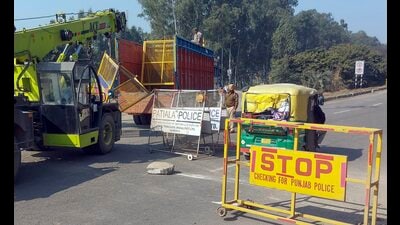 Police barricades put up at Shambhu border (Punjab-Haryana) in view of farmers' 'Delhi Chalo March', in Patiala district, Sunday. (PTI)