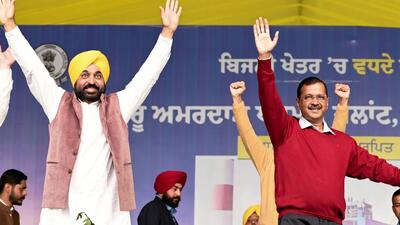 Punjab CM Bhagwant Mann with Delhi CM Arvind Kejriwal during a rally in Tarn Taran district on Sunday. (PTI) Punjab CM Bhagwant Mann with Delhi CM Arvind Kejriwal during a rally in Tarn Taran district on Sunday. (PTI)