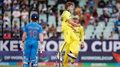 Raf MacMillan (C), the only spinner in the Australia bowling line-up, played a key role for the eventual champions, picking three wickets for 43 runs, which included the dismissal of India's Sachin Dhas.&nbsp; (AFP)