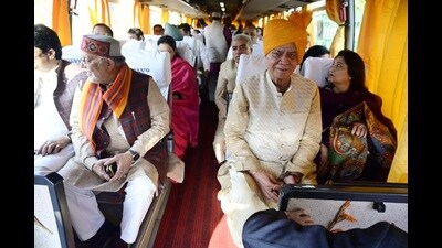U.P. Vidhan Sabha speaker Satish Mahana (in headgear) and other lawmakers during their bus ride to Ayodhya on Feb 11 (Deepak Gupta/HT) U.P. Vidhan Sabha speaker Satish Mahana (in headgear) and other lawmakers during their bus ride to Ayodhya on Feb 11 (Deepak Gupta/HT)