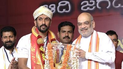Union home minister Amit Shah felicitates sculptor Arun Yogiraj, whose idol of Ram Lalla has been installed at Ram Temple in Ayodhya, during a programme, in Mysore (PTI) Union home minister Amit Shah felicitates sculptor Arun Yogiraj, whose idol of Ram Lalla has been installed at Ram Temple in Ayodhya, during a programme, in Mysore (PTI)