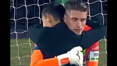 The image shows a kid hugging a goalkeeper. The pic is taken from a video Anand Mahindra posted on X. (Screenshot) The image shows a kid hugging a goalkeeper. The pic is taken from a video Anand Mahindra posted on X. (Screenshot)