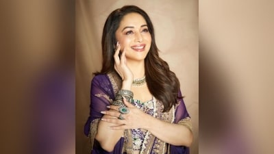 Assisted by make-up artist Lekha Gupta, Madhuri donned pink eyeshadow, black winged eyeliner, darkened eyebrows, rosy cheeks, luminous highlighter and a shade of glossy pink lipstick. She styled her lush locks into soft curls and left them open at the side, cascading beautifully down her shoulders to complete her stunning look. (Instagram/@madhuridixitnene) Assisted by make-up artist Lekha Gupta, Madhuri donned pink eyeshadow, black winged eyeliner, darkened eyebrows, rosy cheeks, luminous highlighter and a shade of glossy pink lipstick. She styled her lush locks into soft curls and left them open at the side, cascading beautifully down her shoulders to complete her stunning look. (Instagram/@madhuridixitnene)