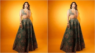 Pooja's green lehenga comes in a luxurious silk fabric and features a plunging neckline blouse embellished all over with padding, resham and zardozi embroidery. She paired it up with a regal cancan lehenga embellished with floral, paisley embroidery in resham, zardozi detailing and badla texture work. (Instagram/@hegdepooja) Pooja's green lehenga comes in a luxurious silk fabric and features a plunging neckline blouse embellished all over with padding, resham and zardozi embroidery. She paired it up with a regal cancan lehenga embellished with floral, paisley embroidery in resham, zardozi detailing and badla texture work. (Instagram/@hegdepooja)