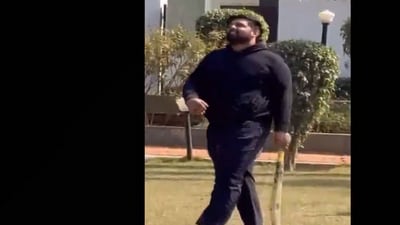 RJD MLA Chetan Anand was seen playing cricket in one of the videos from Yadav's residence. (ANI) RJD MLA Chetan Anand was seen playing cricket in one of the videos from Yadav's residence. (ANI)