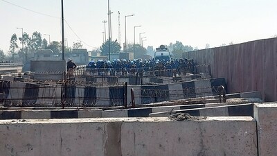 Police barricades put up at Shambhu border (Punjab-Haryana) on Sunday ahead of farmers' 'Delhi Chalo' march to be held on February 13. (PTI) Police barricades put up at Shambhu border (Punjab-Haryana) on Sunday ahead of farmers' 'Delhi Chalo' march to be held on February 13. (PTI)
