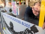 Peter Precourt levels a sign in the front window for the "There Goes My Hero: Chapter 1 Peyton Brewer-Ross" show. One of the 18 people killed in the deadliest mass shooting in Maine history is being remembered in art, including some of his own. An art exhibit this weekend paid tribute to Peyton Brewer-Ross, a Navy shipbuilder and father. Peter Precourt levels a sign in the front window for the "There Goes My Hero: Chapter 1 Peyton Brewer-Ross" show. One of the 18 people killed in the deadliest mass shooting in Maine history is being remembered in art, including some of his own. An art exhibit this weekend paid tribute to Peyton Brewer-Ross, a Navy shipbuilder and father.