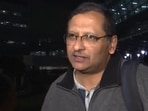 An Indian Navy veteran at the Delhi airport after returning from Qatar.