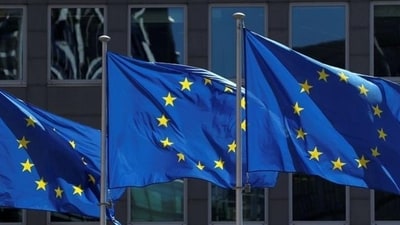 European Union flags outside the European Commission headquarters in Brussels, Belgium. European Union flags outside the European Commission headquarters in Brussels, Belgium.