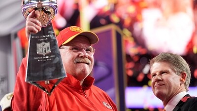 Kansas City Chiefs head coach Andy Reid holds the Vince Lombardi Trophy as Kansas City Chiefs chairman and CEO Clark Hunt looks on after the NFL Super Bowl 58 football game against the San Francisco 49ers on Sunday, Feb. 11, 2024, in Las Vegas. The Chiefs won 25-22.(AP Photo/Ashley Landis) (AP) Kansas City Chiefs head coach Andy Reid holds the Vince Lombardi Trophy as Kansas City Chiefs chairman and CEO Clark Hunt looks on after the NFL Super Bowl 58 football game against the San Francisco 49ers on Sunday, Feb. 11, 2024, in Las Vegas. The Chiefs won 25-22.(AP Photo/Ashley Landis) (AP)