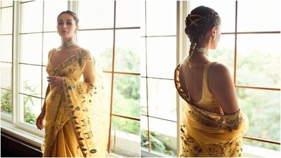 Talking about saree fashion and not mentioning Alia Bhatt is not fair. The stylish diva wowed her fans when she donned a stunning yellow saree from Anavila's Aamod collection. The saree comes in a pleasant summer yellow and is embroidered with house sparrows, banana leaves and blooming flowers in various shades of green, red, white, brown and gold. Paired with a matching sleeveless blouse, she looked like an elegant princess. Her soft makeup look, choker necklace and chic braided hairdo added the perfect finishing touches. (Instagram/@aliaabhatt) Talking about saree fashion and not mentioning Alia Bhatt is not fair. The stylish diva wowed her fans when she donned a stunning yellow saree from Anavila's Aamod collection. The saree comes in a pleasant summer yellow and is embroidered with house sparrows, banana leaves and blooming flowers in various shades of green, red, white, brown and gold. Paired with a matching sleeveless blouse, she looked like an elegant princess. Her soft makeup look, choker necklace and chic braided hairdo added the perfect finishing touches. (Instagram/@aliaabhatt)