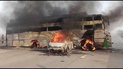 Bot the bus and the car caught fire after the collision. (HT Photo) Bot the bus and the car caught fire after the collision. (HT Photo)