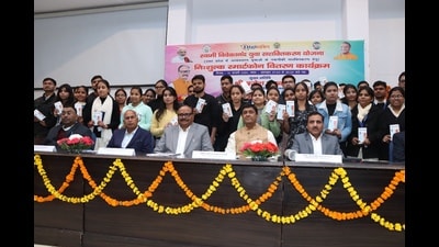 Deputy CM Brajesh Pathak at the National PG College with staff and students. (HT Photo)