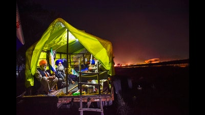 Farmers in a trolley ahead of their scheduled march towards Delhi in Fatehgarh Sahib on Monday. (PTI) Farmers in a trolley ahead of their scheduled march towards Delhi in Fatehgarh Sahib on Monday. (PTI)