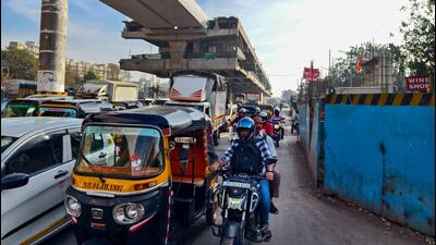 Mumbai, India. Feb 12, 2024 - A bottleneck at Dahisar toll plaza, north bound. Bottleneck is causing daily traffic jams for commuters.due to Metro pillar construction work near Dahisar toll plaza. Feb 12,2024. (Photo by Raju Shinde/HT Photo) Mumbai, India. Feb 12, 2024 - A bottleneck at Dahisar toll plaza, north bound. Bottleneck is causing daily traffic jams for commuters.due to Metro pillar construction work near Dahisar toll plaza. Feb 12,2024. (Photo by Raju Shinde/HT Photo)