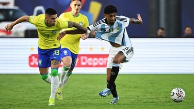 Brazil's Gabriel Pec (L) and Argentina's Cristian Medina (R) fight for the ball (AFP) Brazil's Gabriel Pec (L) and Argentina's Cristian Medina (R) fight for the ball (AFP)