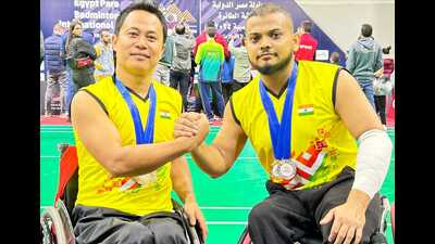 Para badminton player Abu Hubaida (left) with his doubles partner Prem Aale after their victory at Egypt qualifiers. (SOURCED) Para badminton player Abu Hubaida (left) with his doubles partner Prem Aale after their victory at Egypt qualifiers. (SOURCED)