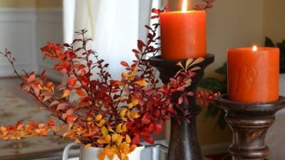 2. Candle stands are another must-have for creating a warm and inviting atmosphere. One can even choose sleek and modern designs that complement the decor style, and opt for scented candles in uplifting fragrances like citrus or lavender to enhance the mood-boosting effect. (Photo by Pinterest) 2. Candle stands are another must-have for creating a warm and inviting atmosphere. One can even choose sleek and modern designs that complement the decor style, and opt for scented candles in uplifting fragrances like citrus or lavender to enhance the mood-boosting effect. (Photo by Pinterest)