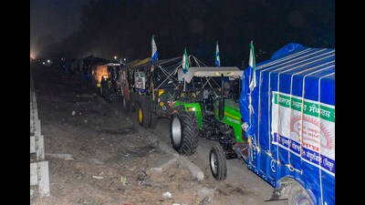 Tractors and trolleys parked roadside ahead of ‘Delhi Chalo’ march by farmers in Fatehgarh Sahib on Monday. (PTI) Tractors and trolleys parked roadside ahead of ‘Delhi Chalo’ march by farmers in Fatehgarh Sahib on Monday. (PTI)