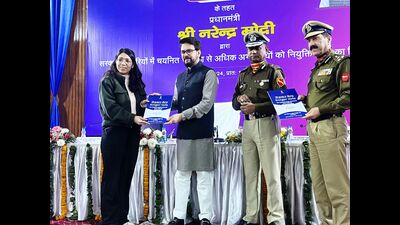 Union minister for information and broadcasting Anurag Thakur on Monday handed over employment letters to youth at the BSF Frontier headquarters in Jalandhar under the central government’s Rozgar mela programme. (HT Photo) Union minister for information and broadcasting Anurag Thakur on Monday handed over employment letters to youth at the BSF Frontier headquarters in Jalandhar under the central government’s Rozgar mela programme. (HT Photo)