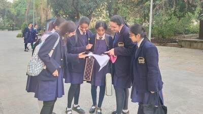 Students at La Martiniere discussing about their question paper with their friends after day 1 of the exam here in Lucknow Students at La Martiniere discussing about their question paper with their friends after day 1 of the exam here in Lucknow