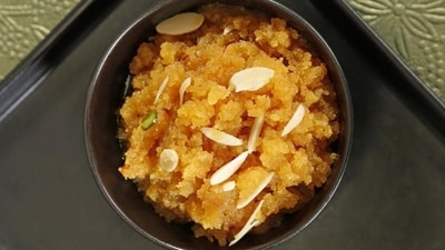Yellow Moong Dal Halwa: A rich and indulgent dessert made with yellow moong dal, ghee, and sugar, and flavoured with cardamom, perfect for celebrating the arrival of spring. (Shutterstock) Yellow Moong Dal Halwa: A rich and indulgent dessert made with yellow moong dal, ghee, and sugar, and flavoured with cardamom, perfect for celebrating the arrival of spring. (Shutterstock)