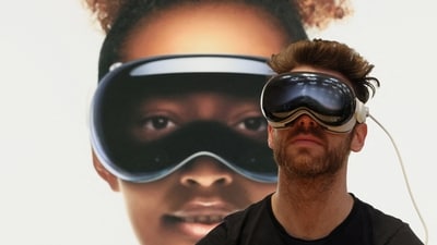A customer uses Apple's Vision Pro headset at the Apple Fifth Avenue store in Manhattan in New York City, (REUTERS)