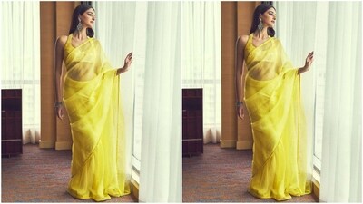 Next on the list, we have the gorgeous Gen Z diva Ananya Pandey. The actress always makes sure to turn heads with her fashion-forward looks. Her yellow saree oozing grace and glamour is no exception and is sure to inspire your Basant Panchami look. She chose an organza saree adorned with shimmering borders all over. She draped it gracefully to let her pallu cascade beautifully over her shoulders. Paired with her marching halterneck blouse, she looks mesmerising. (Instagram/@ananyapanday) Next on the list, we have the gorgeous Gen Z diva Ananya Pandey. The actress always makes sure to turn heads with her fashion-forward looks. Her yellow saree oozing grace and glamour is no exception and is sure to inspire your Basant Panchami look. She chose an organza saree adorned with shimmering borders all over. She draped it gracefully to let her pallu cascade beautifully over her shoulders. Paired with her marching halterneck blouse, she looks mesmerising. (Instagram/@ananyapanday)
