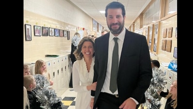 Snapshot of Catie Zwier walking down the school hallway after getting married. (Instagram/@Catie Zwier) Snapshot of Catie Zwier walking down the school hallway after getting married. (Instagram/@Catie Zwier)