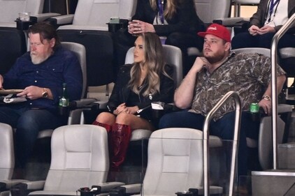 US singer-songwriter Luke Combs (R) and wife Nicole Hocking attend Super Bowl LVIII between the Kansas City Chiefs and the San Francisco 49ers at Allegiant Stadium in Las Vegas, Nevada, February 11, 2024. (Photo by Patrick T. Fallon / AFP) (AFP) US singer-songwriter Luke Combs (R) and wife Nicole Hocking attend Super Bowl LVIII between the Kansas City Chiefs and the San Francisco 49ers at Allegiant Stadium in Las Vegas, Nevada, February 11, 2024. (Photo by Patrick T. Fallon / AFP) (AFP)