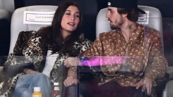 Canadian singer-songwriter Justin Bieber and his wife US model Hailey Bieber watch Super Bowl LVIII between the Kansas City Chiefs and the San Francisco 49ers at Allegiant Stadium in Las Vegas, Nevada, February 11, 2024. (Photo by Patrick T. Fallon / AFP)(AFP)