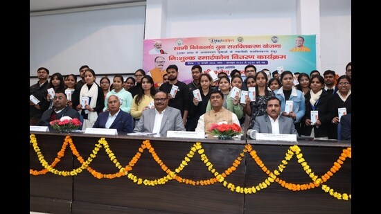 Deputy CM Brajesh Pathak at the National PG College with staff and students. (HT Photo)