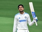 India's Shubman Gill celebrates after scoring a century 