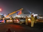 Police personnel stand guard during traffic restrictions near the Shambhu border (Punjab-Haryana) ahead of the farmers' Delhi Chalo march on February 13. Police personnel stand guard during traffic restrictions near the Shambhu border (Punjab-Haryana) ahead of the farmers' Delhi Chalo march on February 13.