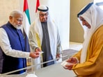 Prime Minister Narendra Modi and UAE President Mohamed bin Zayed Al Nahyan witness a transaction made using the JAYWAN card, based on India's digital RuPay credit and debit card stack, in Abu Dhabi, UAE, Tuesday, Feb. 13, 2024. Prime Minister Narendra Modi and UAE President Mohamed bin Zayed Al Nahyan witness a transaction made using the JAYWAN card, based on India's digital RuPay credit and debit card stack, in Abu Dhabi, UAE, Tuesday, Feb. 13, 2024.