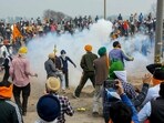 Police use tear gas shells to disperse farmers during their 'Delhi Chalo' march at Punjab-Haryana Shambhu border, near Patiala.