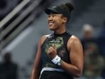 Japan's Naomi Osaka reacts after winning a match against France's Caroline Garcia during the Qatar Open in Doha