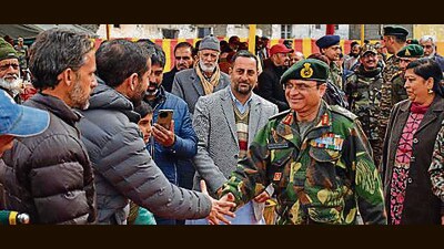 16 Corps commander Lt Gen Navin Sachdeva meeting civilians’ kin at Topa Peer village in Poonch on Monday. (HT Photo)