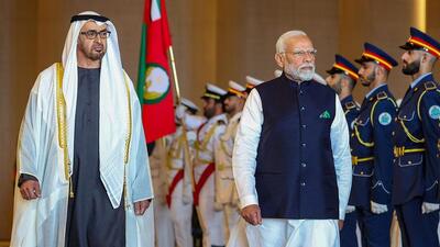 Abu Dhabi: Prime Minister Narendra Modi with UAE President Mohamed bin Zayed Al Nahyan inspects a Guard of Honour upon his arrival on Tuesday. (PTI) Abu Dhabi: Prime Minister Narendra Modi with UAE President Mohamed bin Zayed Al Nahyan inspects a Guard of Honour upon his arrival on Tuesday. (PTI)