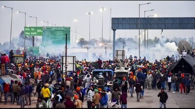 Farmers at the Punjab-Haryana Shambhu border during their 'Delhi Chalo' march, in Patiala district on Tuesday. (PTI)