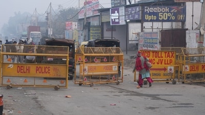 Barricades put up at Singhu border in view of farmers' 'Delhi Chalo' march, in New Delhi, Tuesday (PTI) Barricades put up at Singhu border in view of farmers' 'Delhi Chalo' march, in New Delhi, Tuesday (PTI)