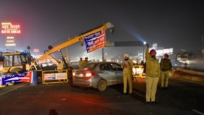 Tractor trolleys departed from various locations in Punjab on Monday to participate in the protest march. At Mehlan Kalan Chowk in Sangrur district, many farmers gathered on their tractor trolleys. These vehicles, adorned with flags of farm unions, were loaded with essential supplies such as dry rations, mattresses, and utensils. (PTI) 