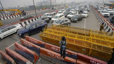 The police have intensified security at Delhi's border points with multi-layer barricades, concrete blocks, iron nails and walls of containers, in view of the 'Delhi Chalo' march. (PTI) The police have intensified security at Delhi's border points with multi-layer barricades, concrete blocks, iron nails and walls of containers, in view of the 'Delhi Chalo' march. (PTI)