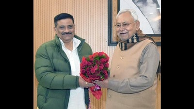Sanjay Jha with Bihar chief minister Nitish Kumar. (File Photo/Santosh Kumar/ Hindustan Times)